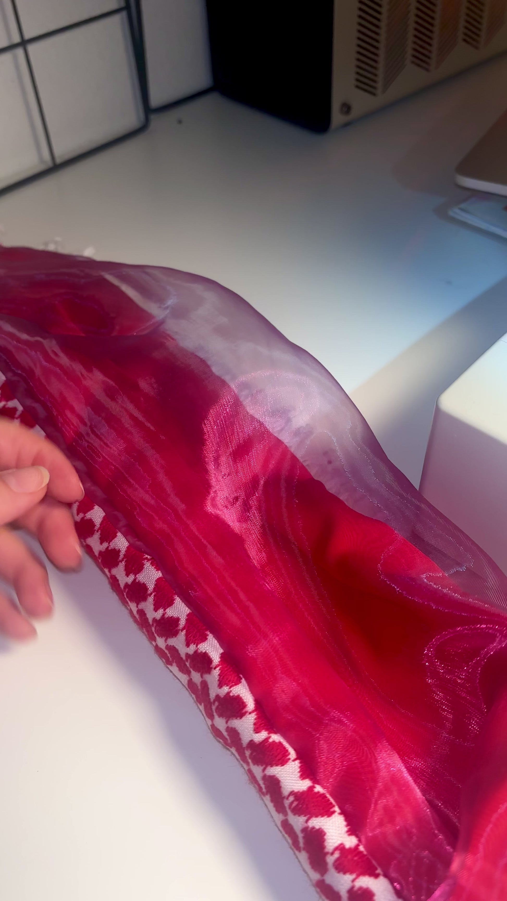 beautiful red keffiyeh with iridescent tones and midnight electric organza